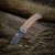 Nóż Składany Turystyczny Woodwarrior - wbity do kory drzewa